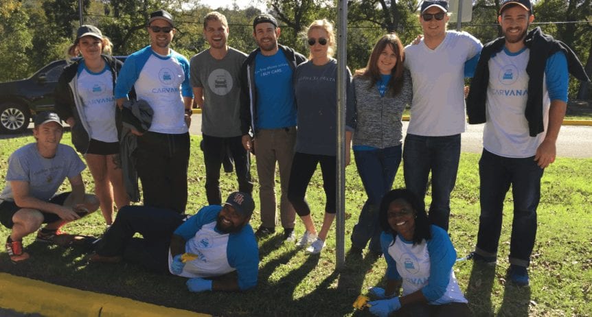 The Carvana team posing for the picture at a volunteer event