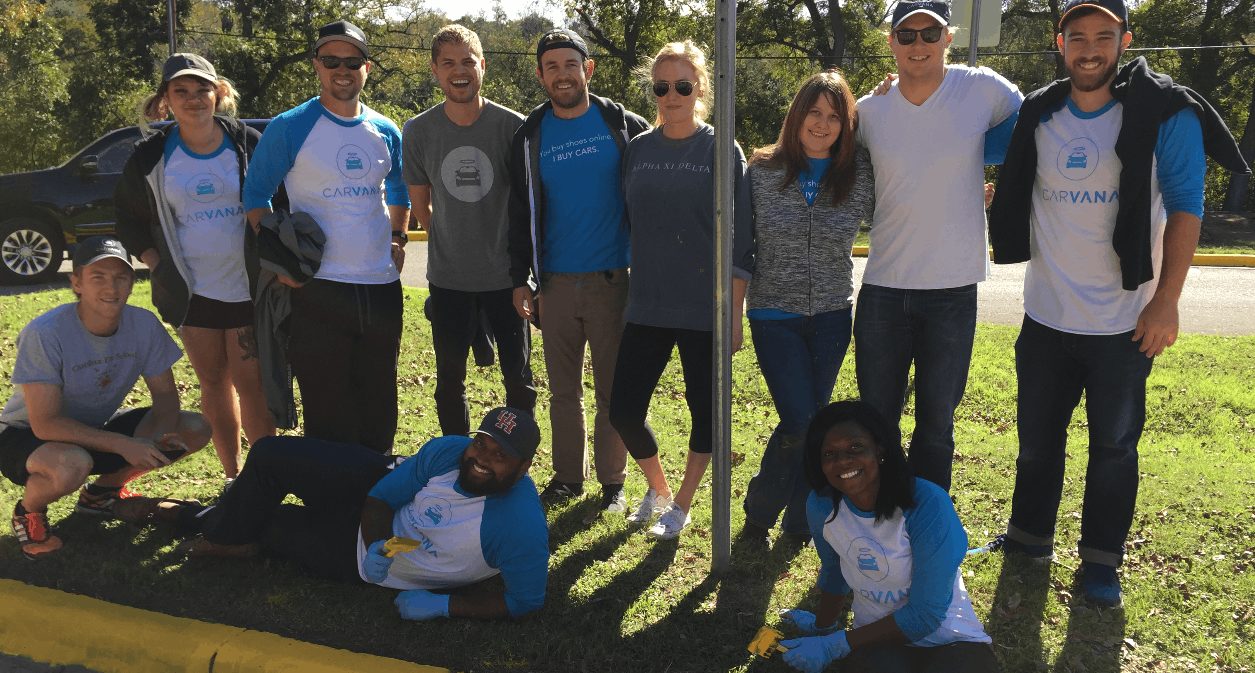 The Carvana team posing for the picture at a volunteer event